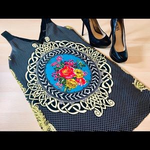 Like new MM Couture size small above knee dress.